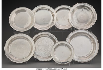 74314: A Collection of Eight Spanish Silver Plates 1-1/