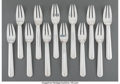 74331: A Set of Twelve Jean Puiforcat Silver Fish Forks