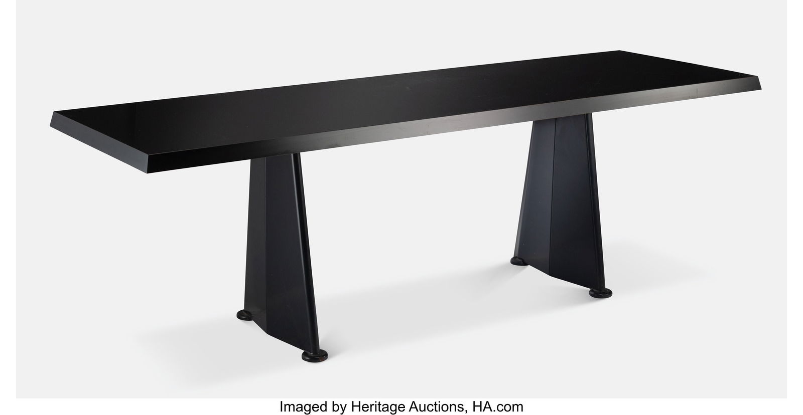 Jean Prouvé Centrale (Trapèze) Table Vitra Fra: Jean Prouvé Centrale (Trapèze) Table Vitra France/Switzerland, 1951/2002 High-pressure laminate, powder-coated steel 28-5/8 x 87-5/8 x 28-3/8 inches (72.7 x 222.6 x 72.1 cm) Applied paper manufactur