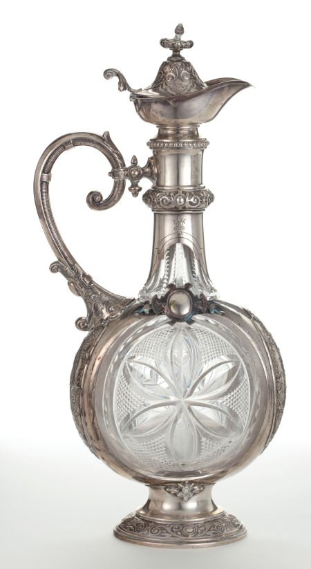 A GERMAN CUT-GLASS AND SILVER AND SILVER GILT EW: A GERMAN CUT-GLASS AND SILVER AND SILVER GILT EWER Circa 1870 Marks: 800M</