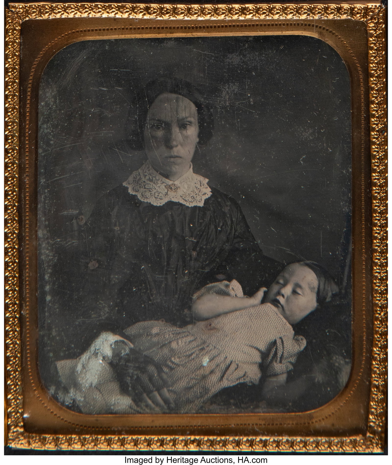 Unknown Daguerreotypist (mid-19th Century) A 1/6: Unknown Daguerreotypist (mid-19th Century) A 1/6-plate Daguerreotype Post-Mortem of a Mother Holding Her Dead Daughter, 1850s Contained in brass mat and preserver. HID031010