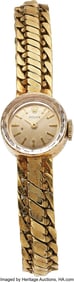 54301: Rolex 14K Yellow Gold Lady's Bracelet Watch Circ