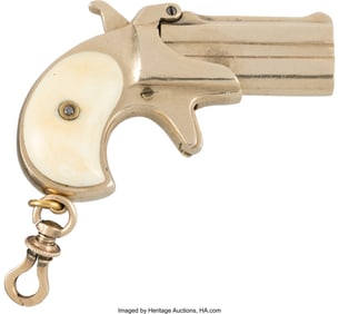 40056: Solid Gold Watch Fob Remington Over and Under De
