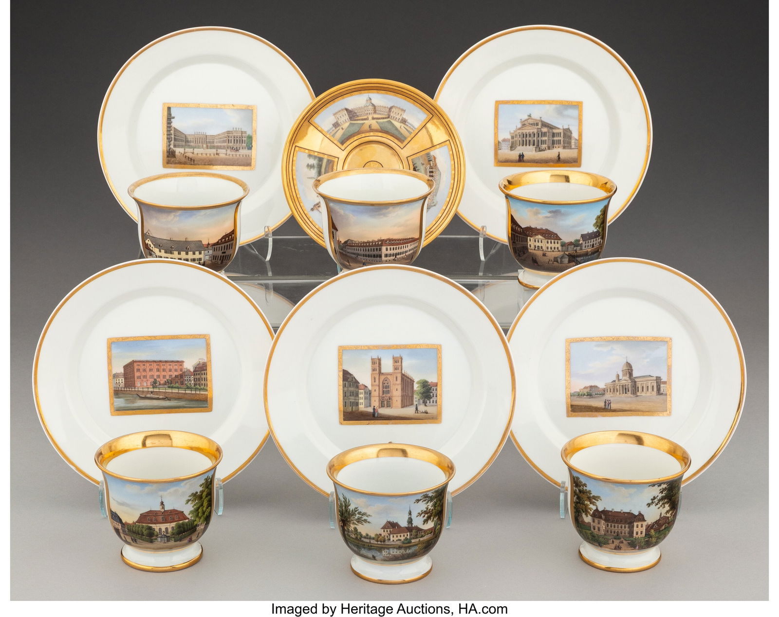 A Collection of Twelve KPM Partial Gilt Porcelai: A Collection of Twelve KPM Partial Gilt Porcelain Cups and Saucers 1-1/8 x 6-7/8 inches (2.9 x 17.5 cm) (largest, saucers, diam.) The lot c