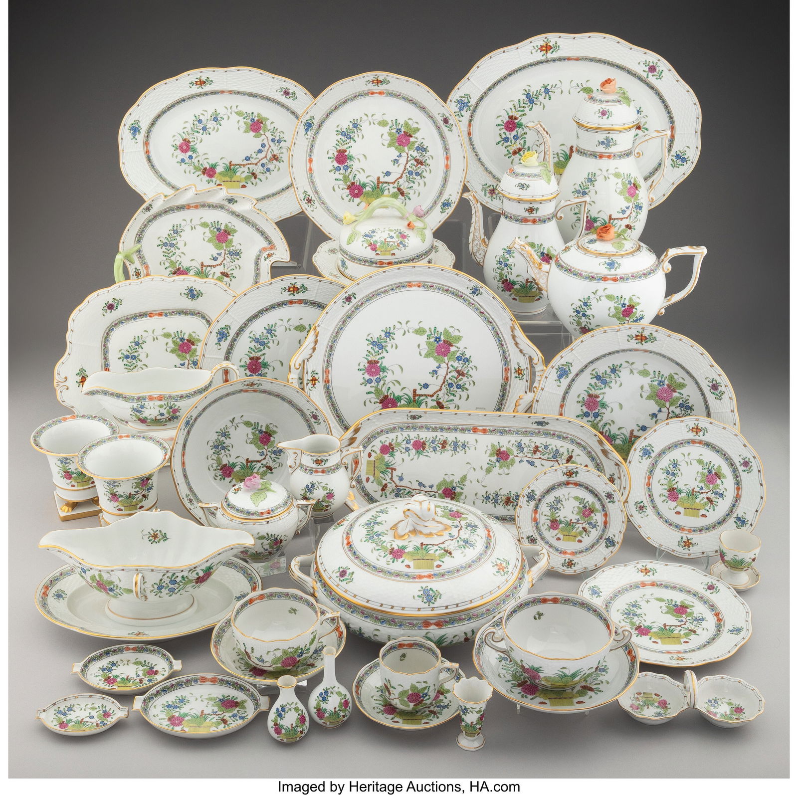 A Two Hundred and Nineteen-Piece Herend Indian B: A Two Hundred and Nineteen-Piece Herend Indian Basket Pattern Partial Gilt Porcelain Dinner Service for Sixteen Marks to tallest: HEREND, HUNGARY, (shield), HANDPAINT