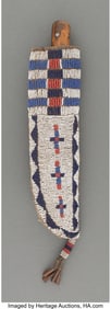 70200: A Cheyenne Beaded Buffalo Hide Knife Sheath and