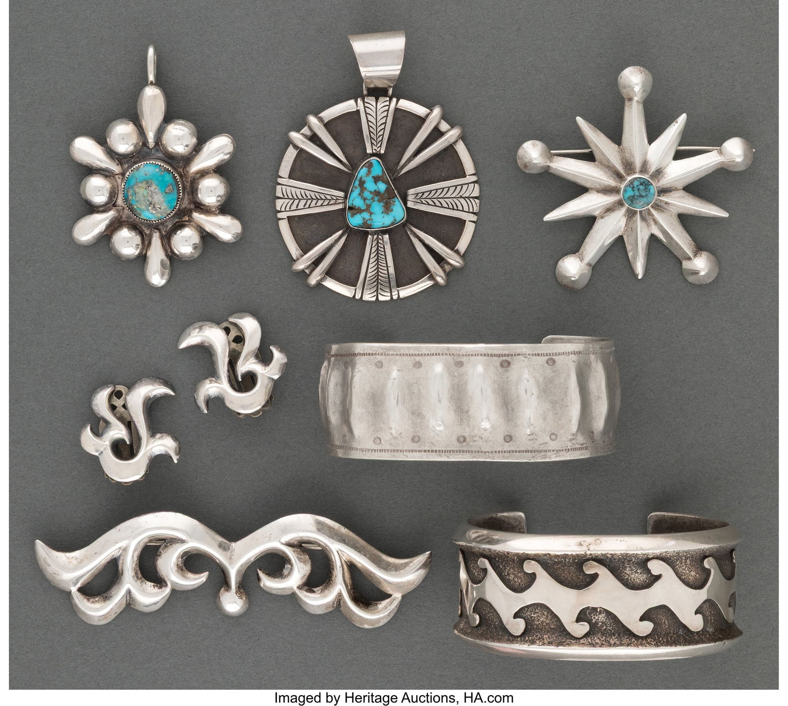 Seven Navajo Style Jewelry Items c. 1970 inclu: Seven Navajo Style Jewelry Items c. 1970 including two pins, one with matching clip-on earrings, two pendants, one stamped Dee Morris; two cuff bracelets, one with