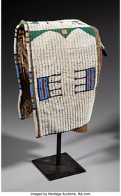 70218: A Sioux Beaded Hide Cradle c. 1890 hide, rawhi