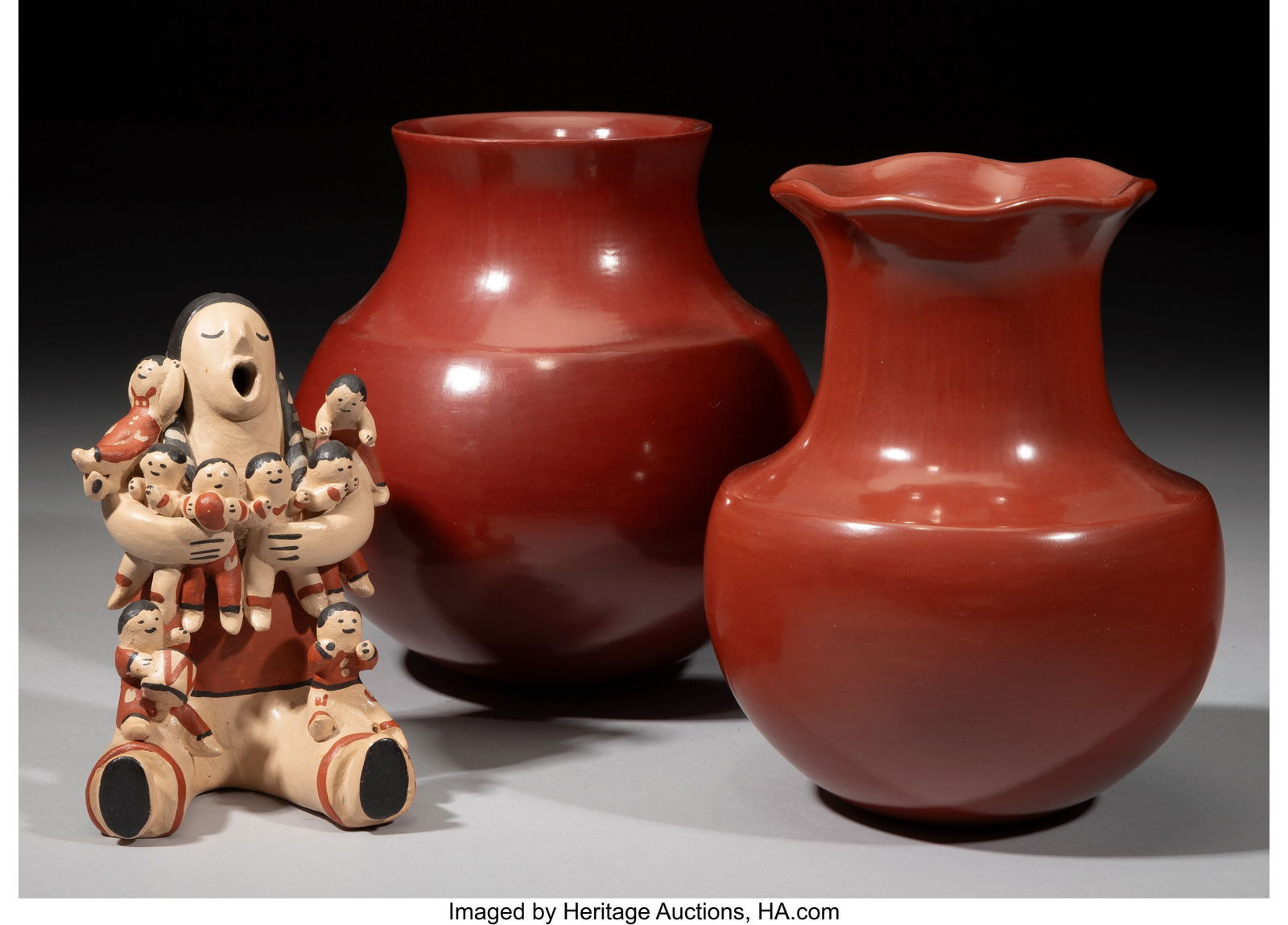 Three Southwest Pottery Items c. 1990 includin: Three Southwest Pottery Items c. 1990 including a Jemez polychrome storyteller signed Juanita MTZ (Martinez); and two Santa Clara redware jars, one signed Tina Garcia&comma
