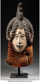 70339: An Igbo Maiden Spirit Helmet Mask, ogbogho mmuo