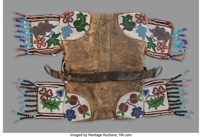 70247: A Cree Woman's Pad Saddle c. 1890 hide, glass