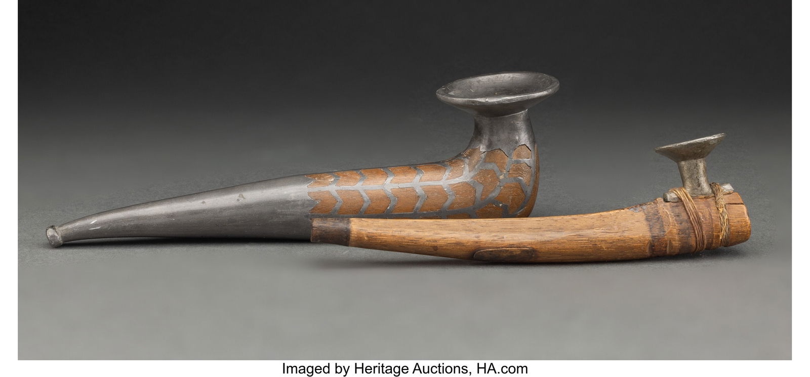 Two Siberian Eskimo Pipes  c. 1870  wood, lead, (1 of 2)