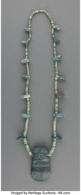 70286: A Necklace with Jade Axe God Celt Pendant and Ja