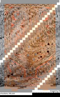 70371&colon; A Batak House Facade Panel  Sumatra&comma; Indonesia&comma; : A Batak House Facade Panel Sumatra&comma; Indonesia&comma; early 20th century A large rectangular hardwood plank carved in medium relief and extensively incised to depict the head of a singa&comma; a