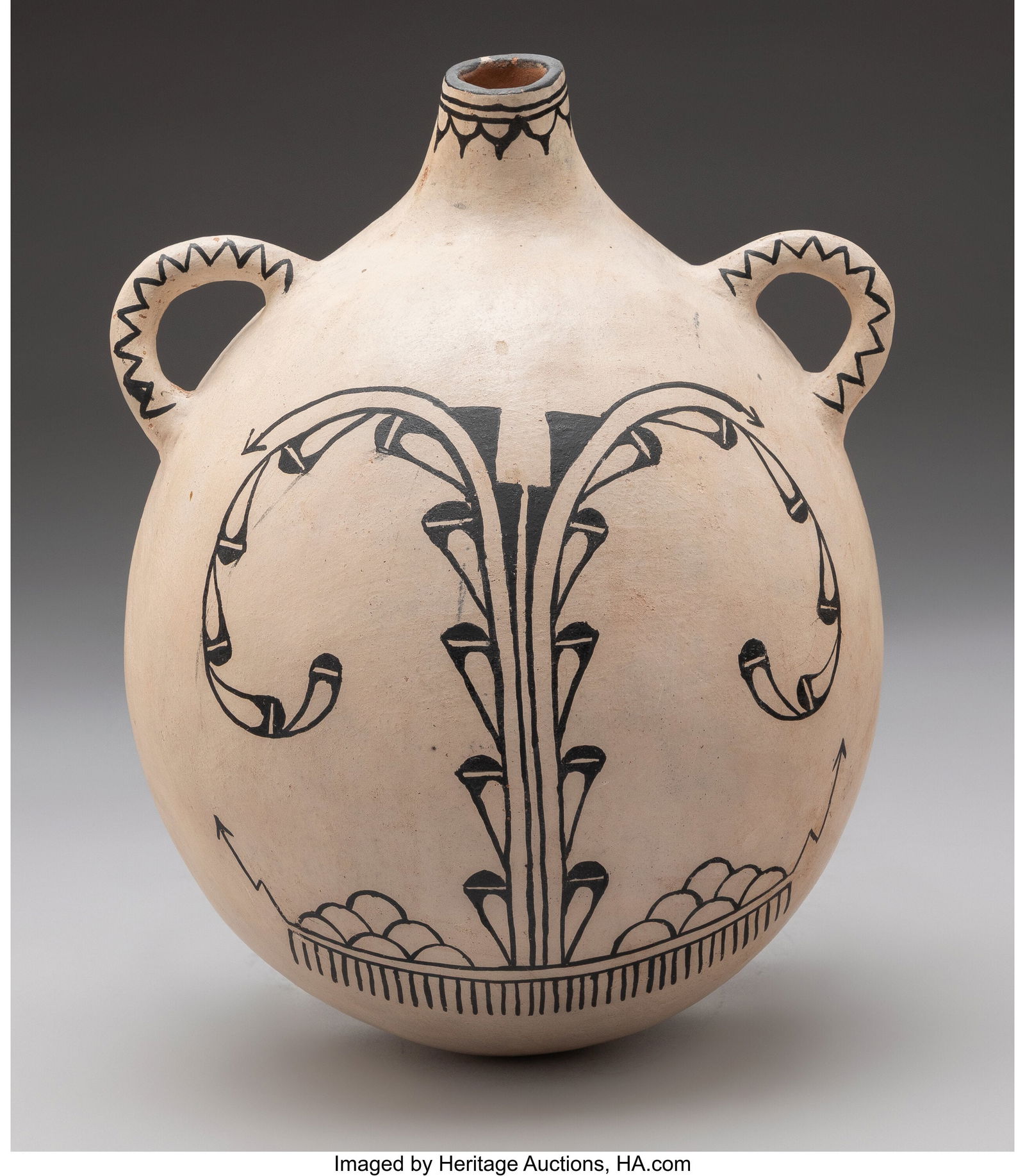 A Large Cochiti Polychrome Canteen c. 1970 Pr: A Large Cochiti Polychrome Canteen c. 1970 Provenance: Property to benefit the Centers for Public Interest Law, including consumer protection and child advocacy at the University of