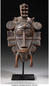 70502: A Senufo Face Mask, kpelie With a custom stand.