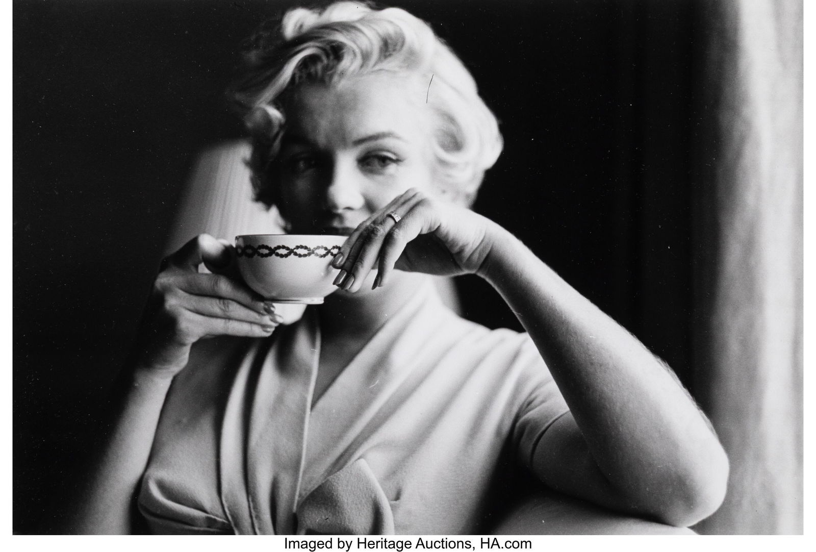 Sam Shaw (American, 1912-1999) Marilyn Monroe Ho: Sam Shaw (American, 1912-1999) Marilyn Monroe Holds a Cup of Tea at the Hotel St. Regis, 1954 Gelatin silver print, printed later 13-1/4 x 9 inches (33&peri