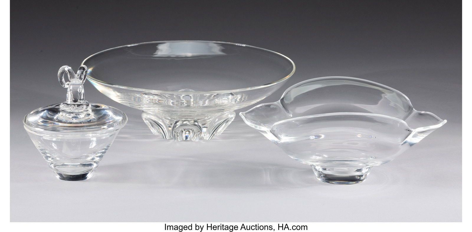 Steuben Glass Works Three Table Articles, mid-20: Steuben Glass Works Three Table Articles, mid-20th century Glass 4-1/4 x 12-5/8 inches (10.8 x 32.1 cm) (Floret bowl) Marks: Steuben The lot compr