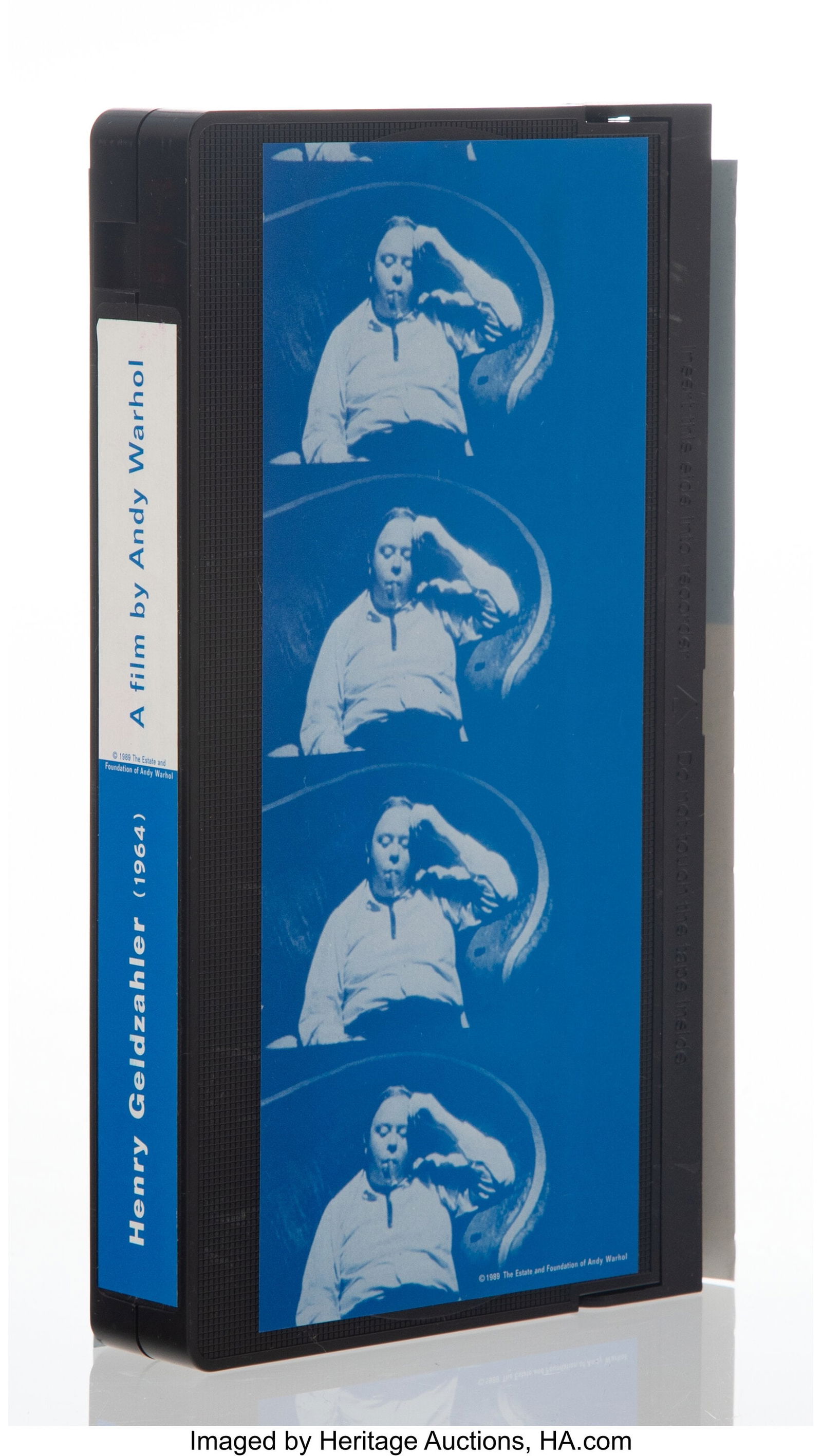 Andy Warhol (1928-1987) Henry Geldzahler, 1964 F: Andy Warhol (1928-1987) Henry Geldzahler, 1964 Film video, VHS transfer of 16mm black and white film, 99 minutes 7-1/2 x 4 x 1 inches (19.1 x 10.2 x