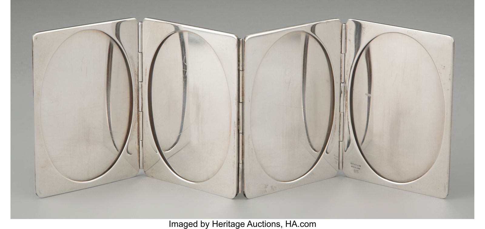 A Tiffany & Co. Silver Folding Quadruple Picture (1 of 4)