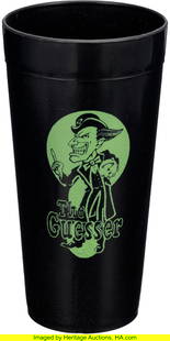 Batman Forever (Warner Bros., 1995), Jim Carrey: Batman Forever (Warner Bros., 1995), Jim Carrey "Riddler" The Guesser Tumbler. Original black plastic drink tumbler with the fictional "The Guesser" character in