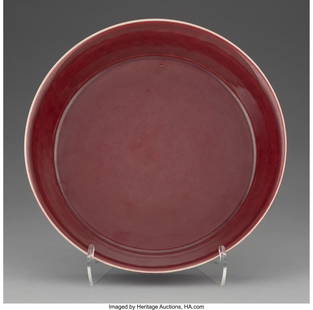 A Chinese Red-Glazed Dish, 20th century Marks: (: A Chinese Red-Glazed Dish, 20th century Marks: (five-character Da Qing Yushanfang, inscribed in ink) 2-1/4 x 9-1/8 x 9-1/8 inches (5.7 x 23.2