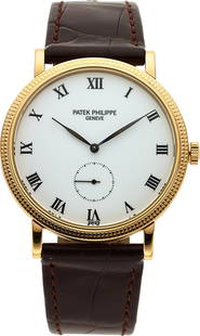 Patek Philippe Calatrava Hobnail Reference 3919J: Patek Philippe Calatrava Hobnail Reference 3919J-001 Yellow Gold Wristwatch Case&colon; 33mm&comma; 18k yellow gold Dial&colon; White dial with black roman numerals and small seconds at 6&comma; Black