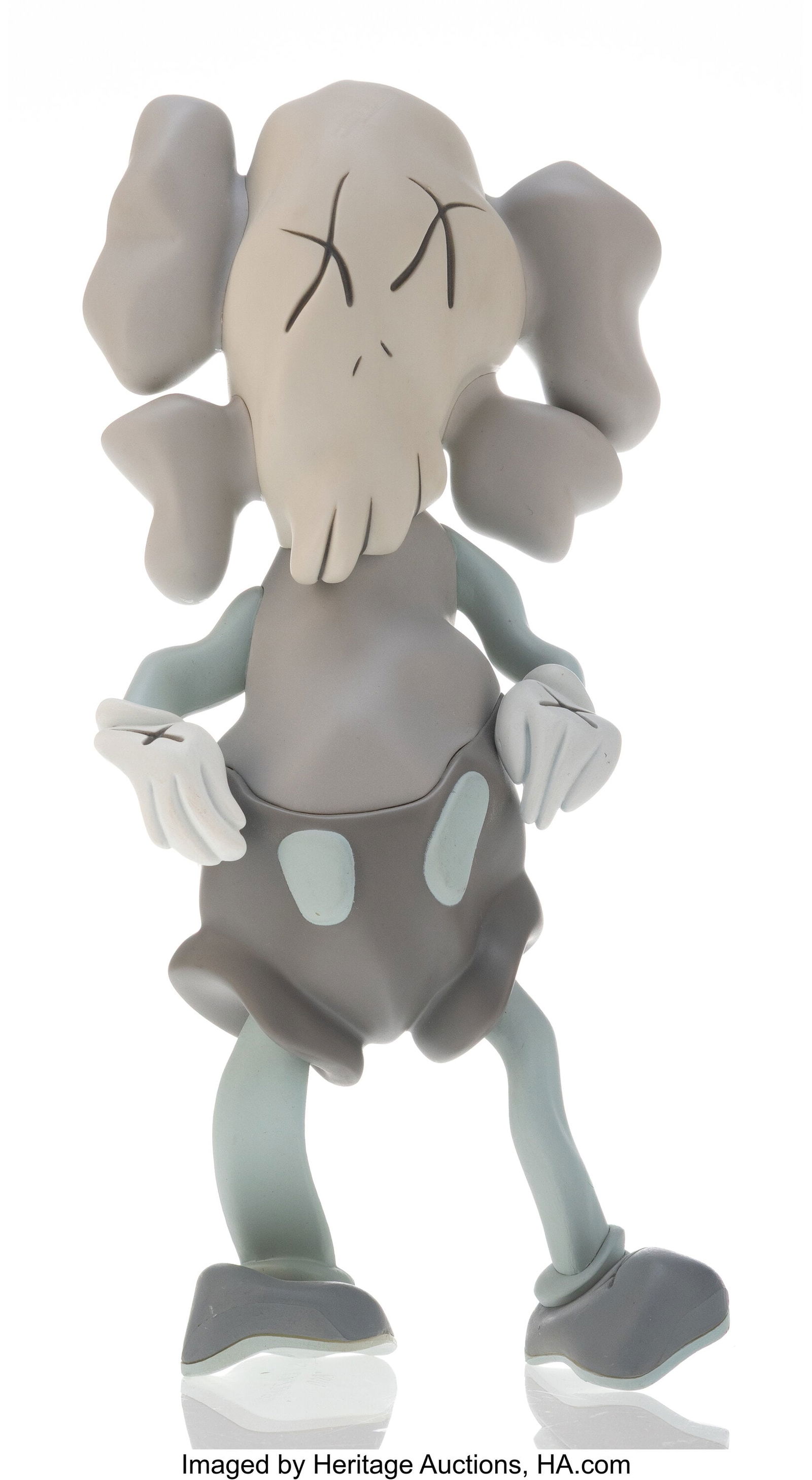 KAWS X Robert Lazzarini Companion (Grey), 2010 P: KAWS X Robert Lazzarini Companion (Grey), 2010 Painted cast vinyl 7 x 5-1/4 x 2-1/2 inches (17.8 x 13.3 x 6.3 cm) Stamped on underside of feet Pr