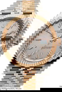 Rolex Datejust 41mm Two Tone Wristwatch with Box: Rolex Datejust 41mm Two Tone Wristwatch with Box and Papers Case&colon; 41MM&comma; Two tone stainless still and rose gold &comma; 2DE16411 Dial&colon; Sundust pink with luminous stick markers &comma;