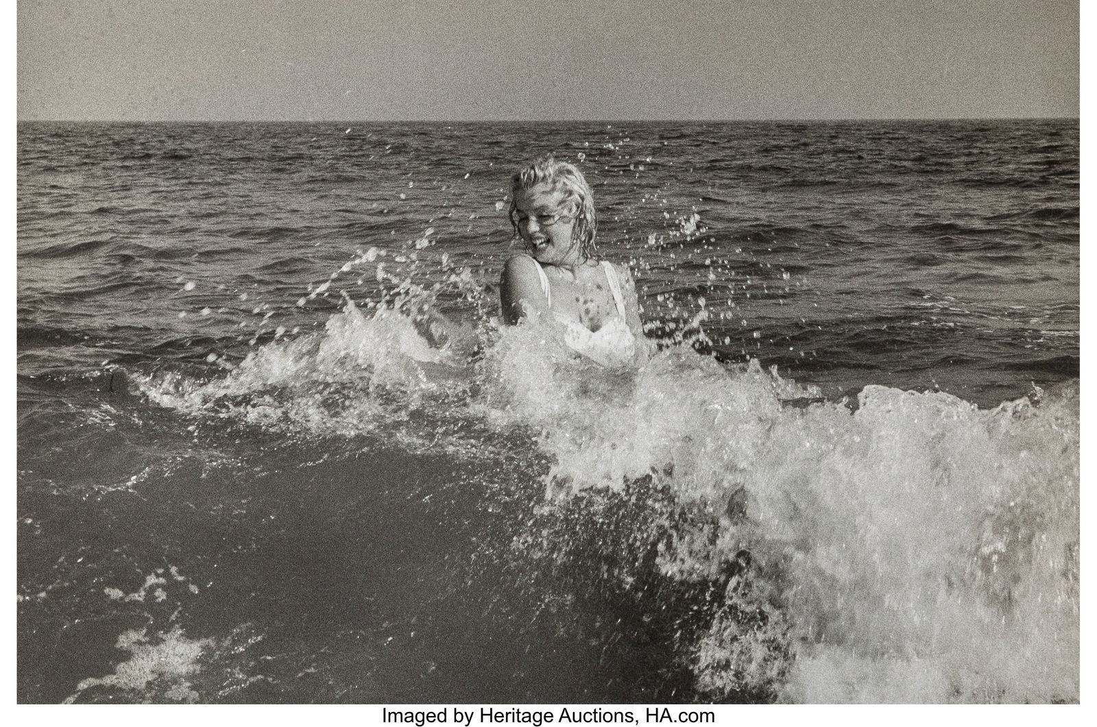 Sam Shaw (American, 1912-1999) Marilyn Monroe on: Sam Shaw (American, 1912-1999) Marilyn Monroe on Amagansett Beach, New York, 1957 Gelatin silver print, printed later 8-7/8 x 13-3/8 inches (22.5