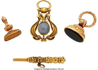 13052: Four Antique Gold Fobs, One With Cabochon Star S