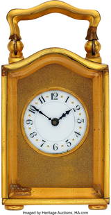 Miniature Carriage Clock Original Fitted Case An: Miniature Carriage Clock Original Fitted Case And Key Measuring 54 x 40 x 40 mm excluding the handle. Enamel dial with Arabic numerals and gold accents. Rectangular gilt brass movement w