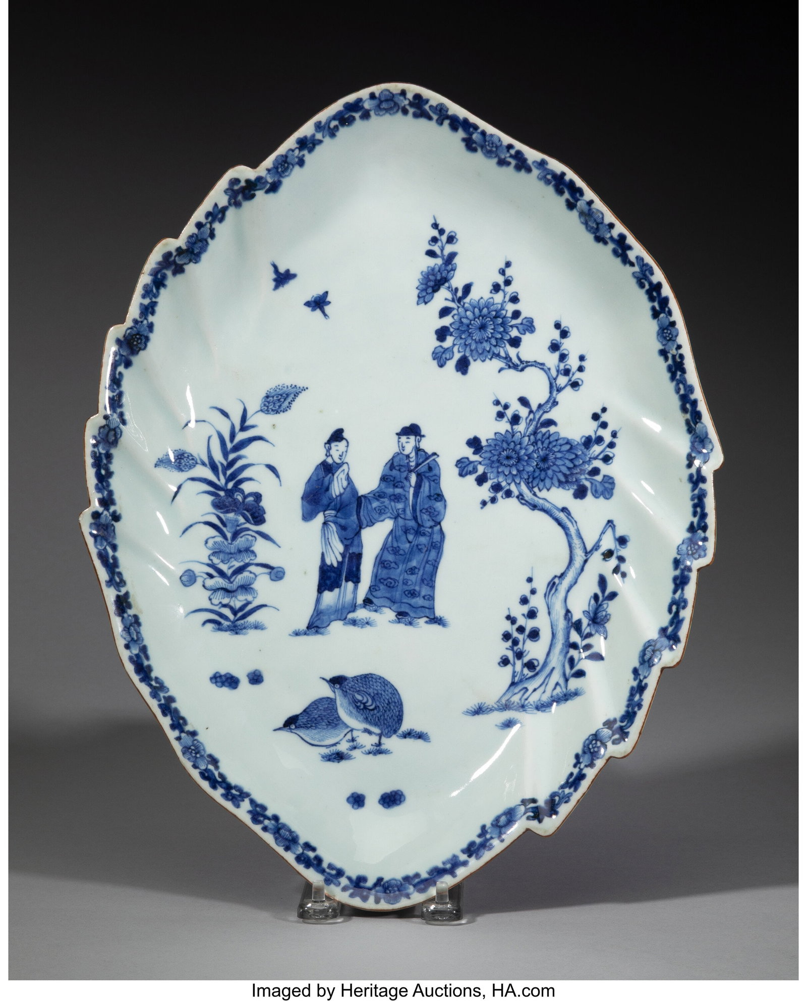 A Chinese Export Blue and White Leaf-Form Tray, : A Chinese Export Blue and White Leaf-Form Tray, Qing dynasty 1-3/4 x 15-3/8 x 11-7/8 inches (4.4 x 39.1 x 30.2 cm) HID03101062020 © 2025 Heritage 