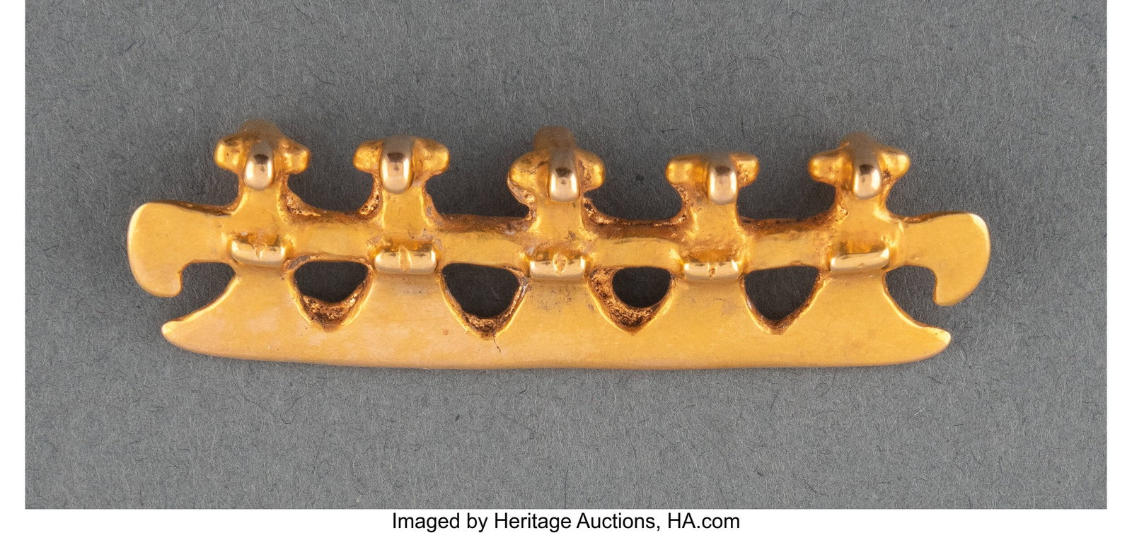 A Pre-Columbian Gold Pendant of Five Joined Bird: A Pre-Columbian Gold Pendant of Five Joined Birds Colombia/Panama, c. 700-1400 AD Very fine gold cast. Three loops on back for suspension. In excellent condition.