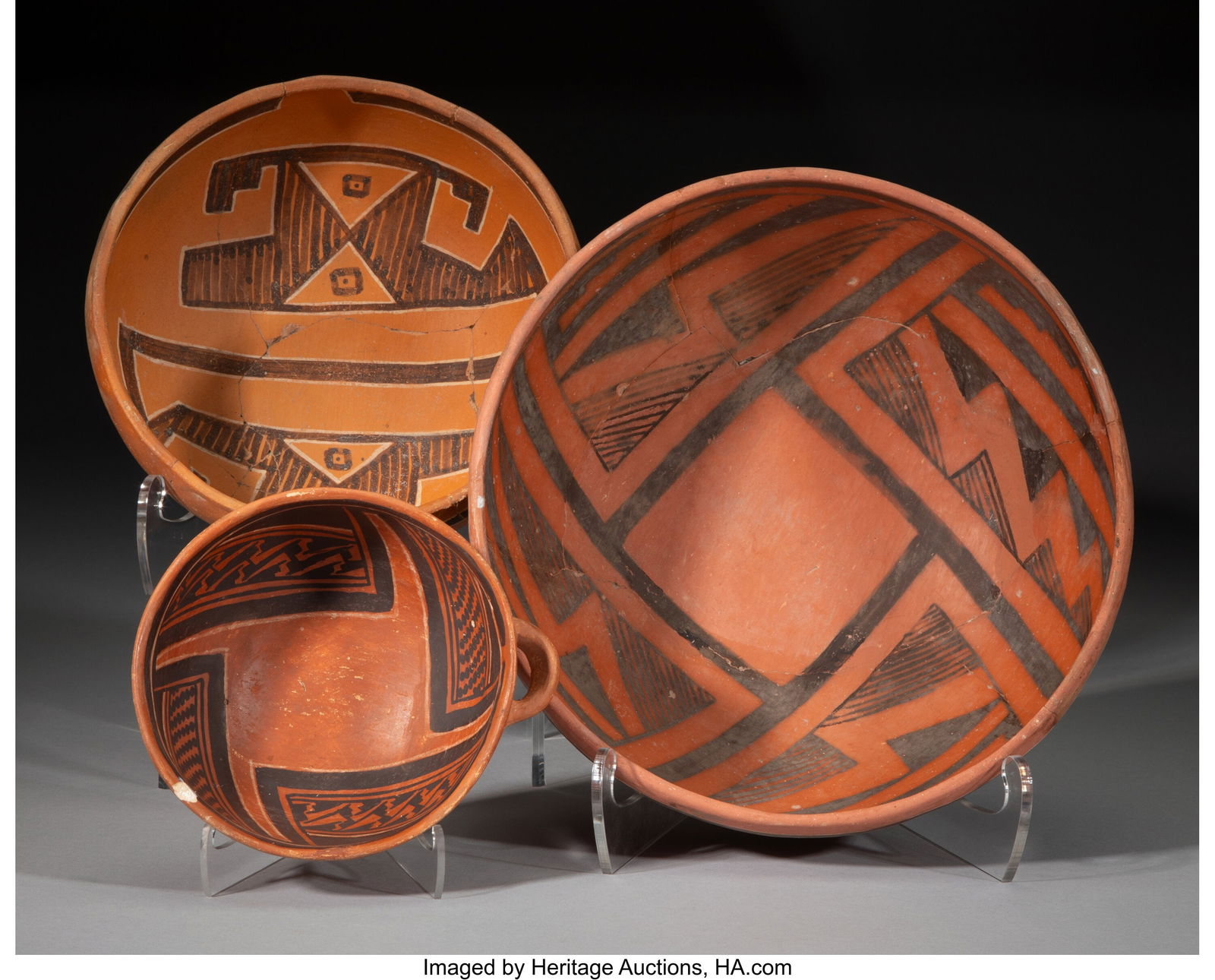 Three Anasazi Polychrome Bowls c. 1150 - 1350: Three Anasazi Polychrome Bowls c. 1150 - 1350 AD Including a small Tusayan dipper painted on the interior with a series of four geometric elements; and two bowls, one probably Four-M