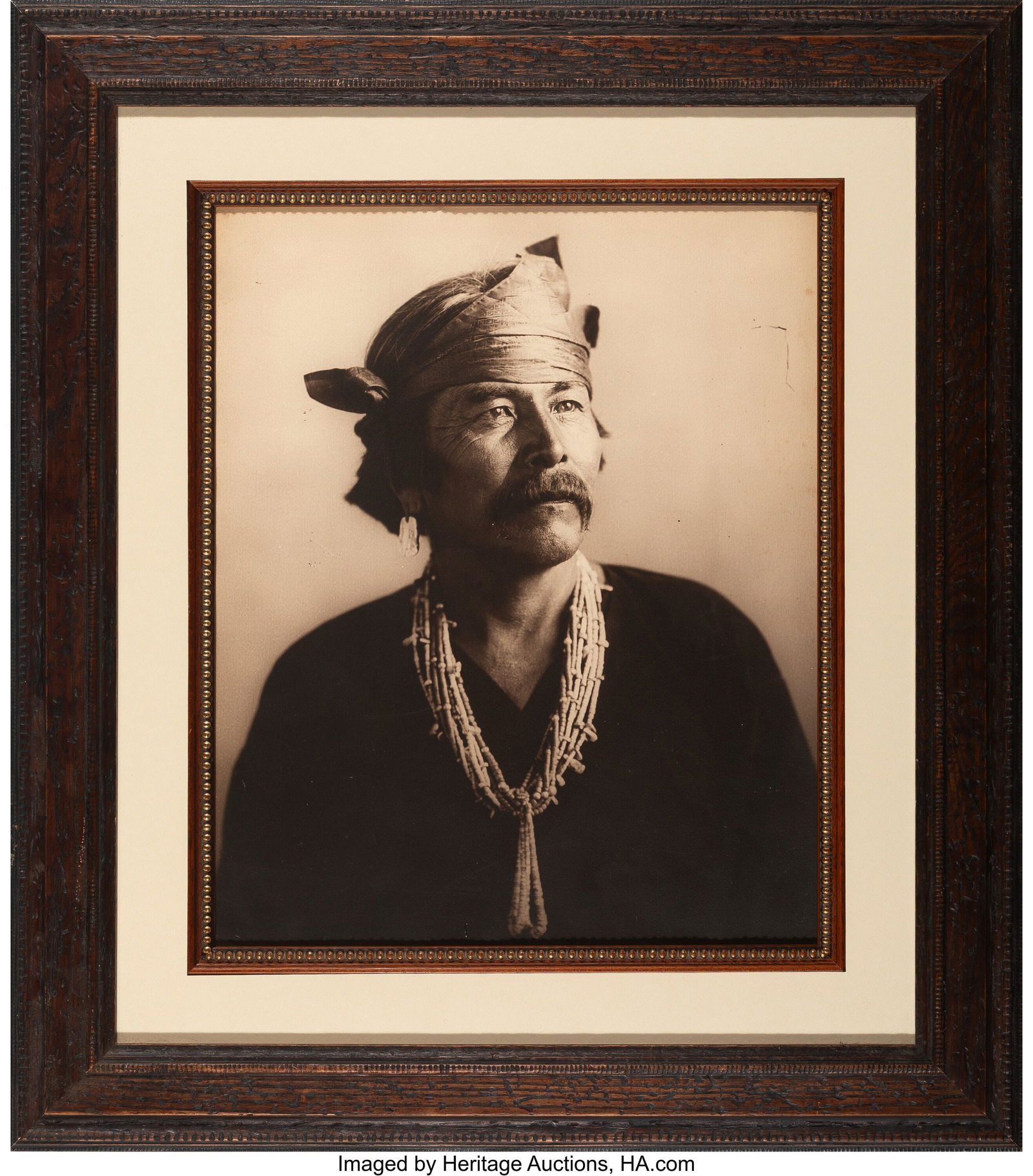 A Large Framed Photograph of Vicente by Carl Moo: A Large Framed Photograph of Vicente by Carl Moon This photo was taken in Moon's Albuquerque studio in 1905. Vicente, or Ochi-za-Begay, died in 1907. See: In Search of