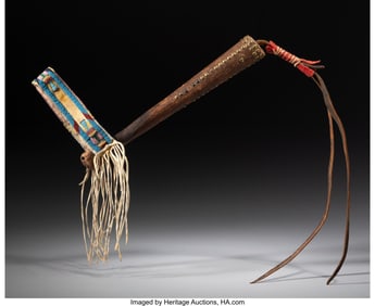 70282&colon; A Crow Quirt  c&period; 1880  The wood form decorated w