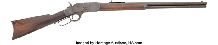 70371&colon; A Winchester Model 1873 Lever Action Rifle Owned