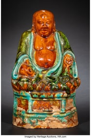 28121&colon; A Chinese Sancai-Glazed Seated Figure&comma; Ming dyna