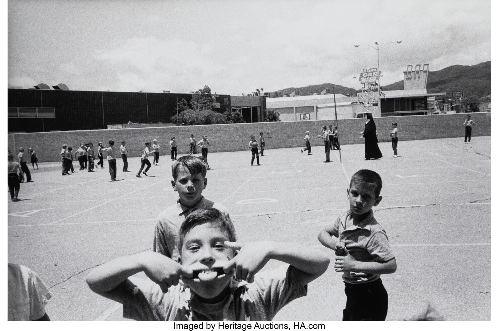 Bruce Davidson (American, b. 1933) Boy Pulling a: Bruce Davidson (American, b. 1933) Boy Pulling a Face, Los Angeles, 1964 Gelatin silver print, printed later 8-3/8 x 12-3/4 inches (21.2 x