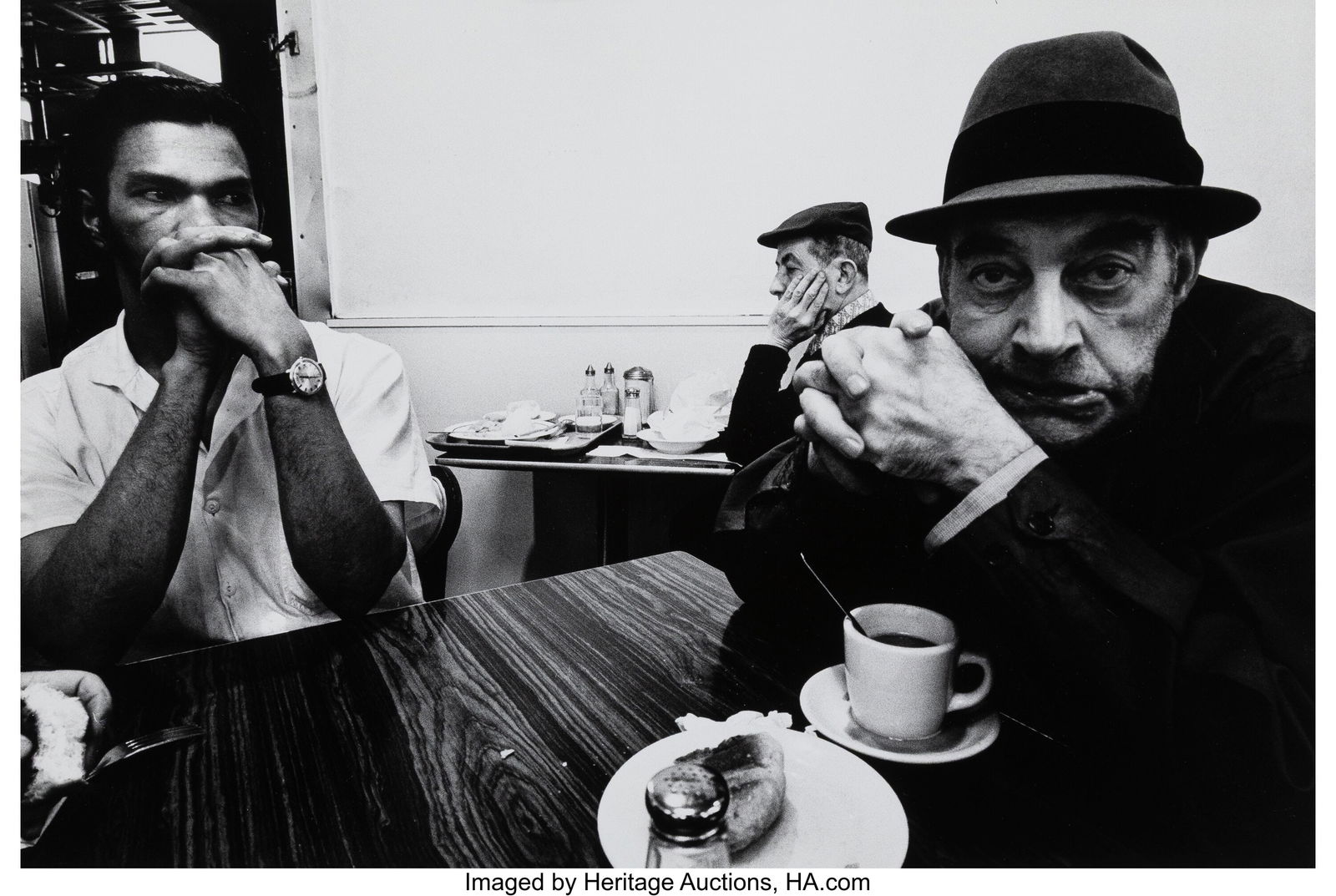 Bruce Davidson (American, b. 1933) Scowling Man,: Bruce Davidson (American, b. 1933) Scowling Man, Garden Cafeteria, New York, 1973 Gelatin silver print, printed later 13 x 19-3/8 inches (33&per