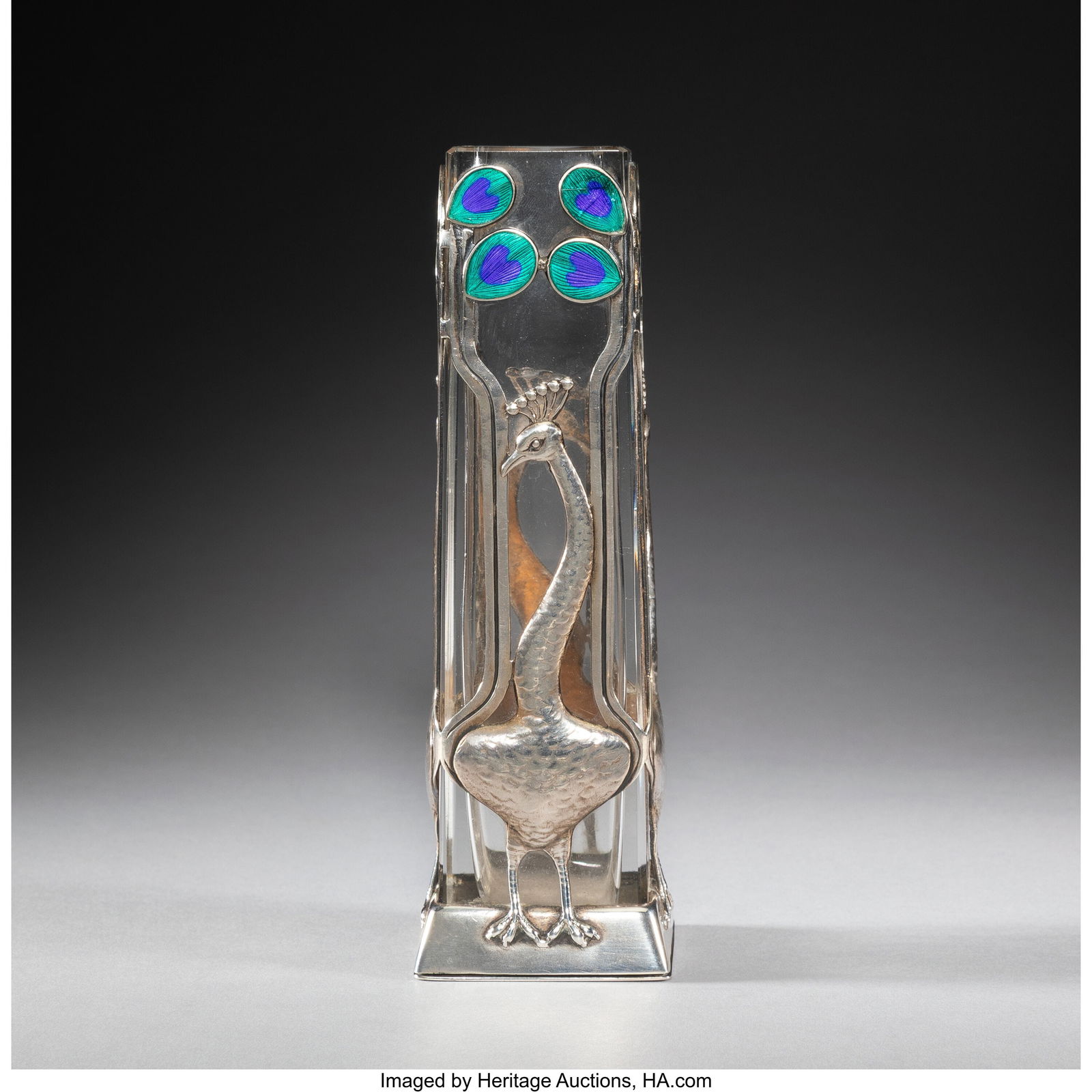 Georg Adam Scheid Peacock Vase, circa 1910 Guill: Georg Adam Scheid Peacock Vase, circa 1910 Guilloché enameled silver, glass 5-1/4 inches (13.3 cm) Marks: G.A.S., (Dianakopf) 237 grams (gross) HID03101062020 © 2025 Heritage Auctions | All Rights R