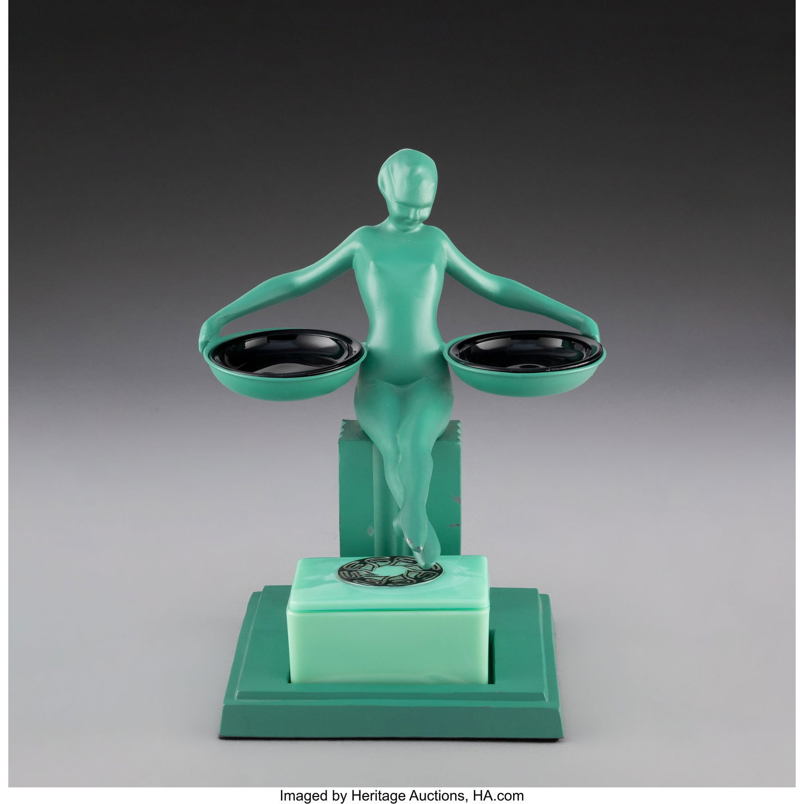 Frankart, Inc. Figural Ashtray, circa 1930 Ename: Frankart, Inc. Figural Ashtray, circa 1930 Enameled metal, glass 9 x 7-1/4 x 6 inches (22.9 x 18.4 x 15.2 cm) Marks: FRANKART INC., T-301, U.S. DES. PAT. 83480 Property from the Collection of Barry Va