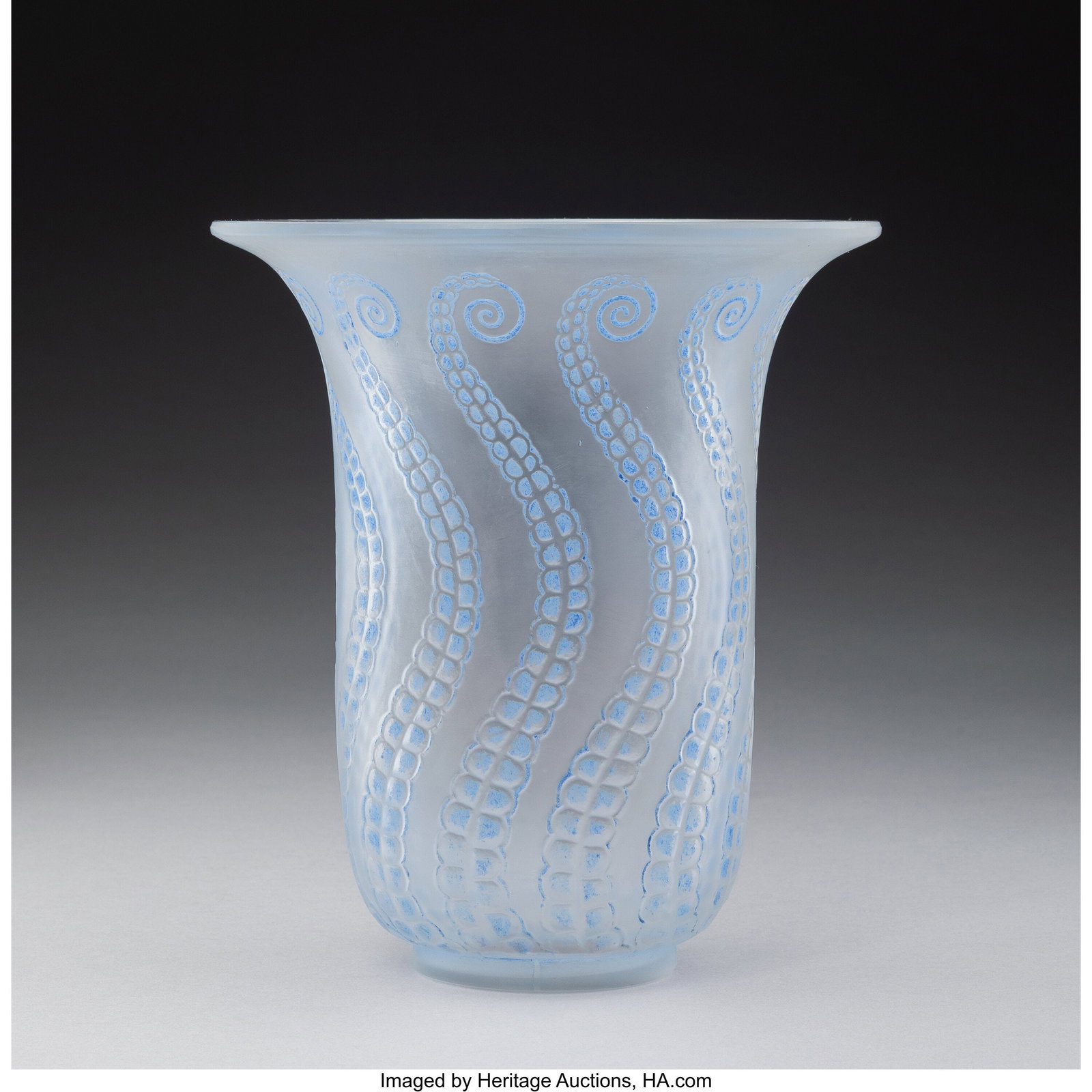 René Lalique Méduse Vase, circa 1921 Clear and: René Lalique Méduse Vase, circa 1921 Clear and frosted glass with blue patina 6-7/8 inches (17.5 cm), M.p. 428, no. 950. Marks: R. LALIQUE, FRANCE Property from the Collection of Rex Rush HID0310106