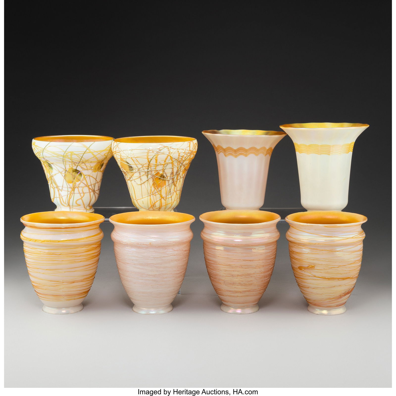 American Eight Shades, early 20th century Irides: American Eight Shades, early 20th century Iridescent glass 5-3/4 inches (14.6 cm) (tallest) Marks to tallest: Lustre Art The lot comprising: 1 Lustre A