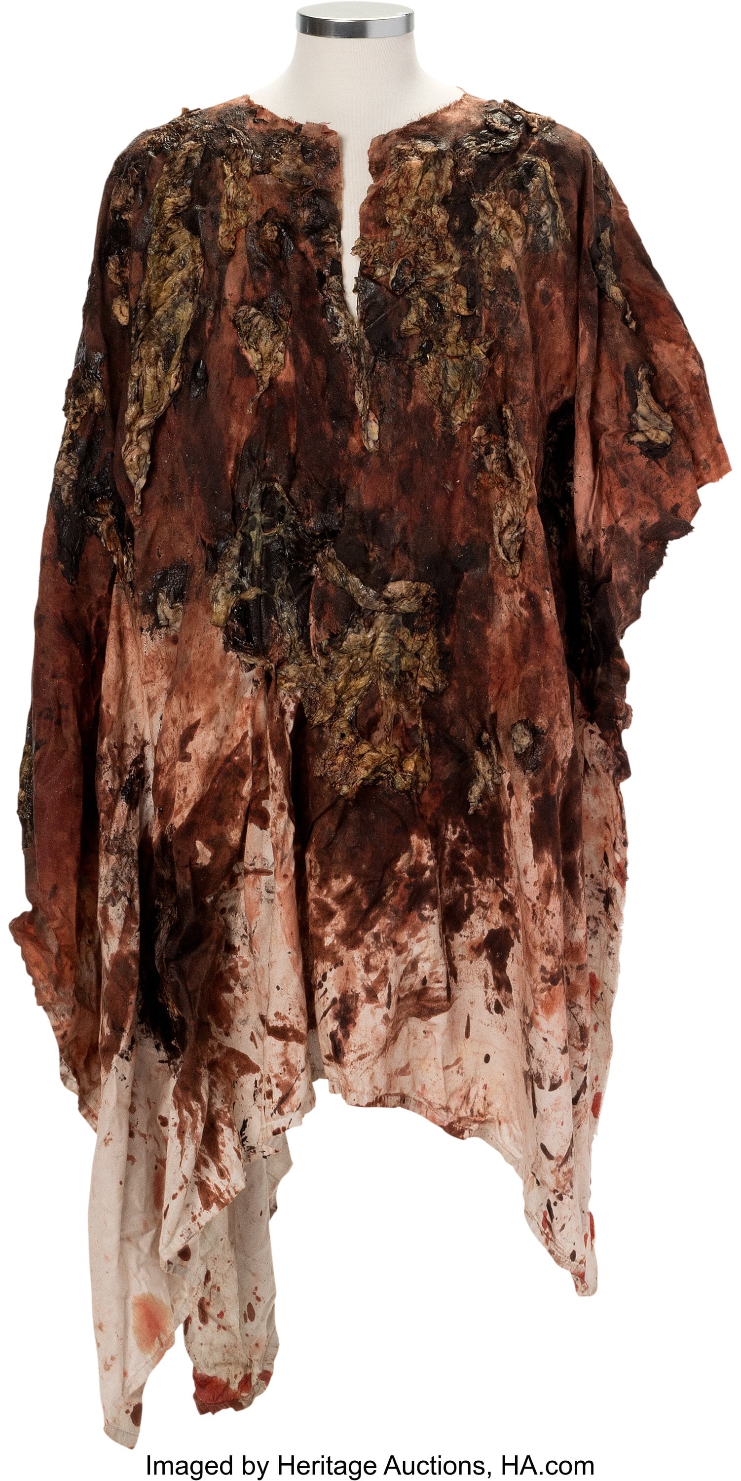 Jessie Anderson (Alexandra Breckenridge), Walker: Jessie Anderson (Alexandra Breckenridge), Walker Guts Poncho from The Walking Dead (AMC 2010-2022, Season 6). Original heavily distressed beige poncho crafted fr