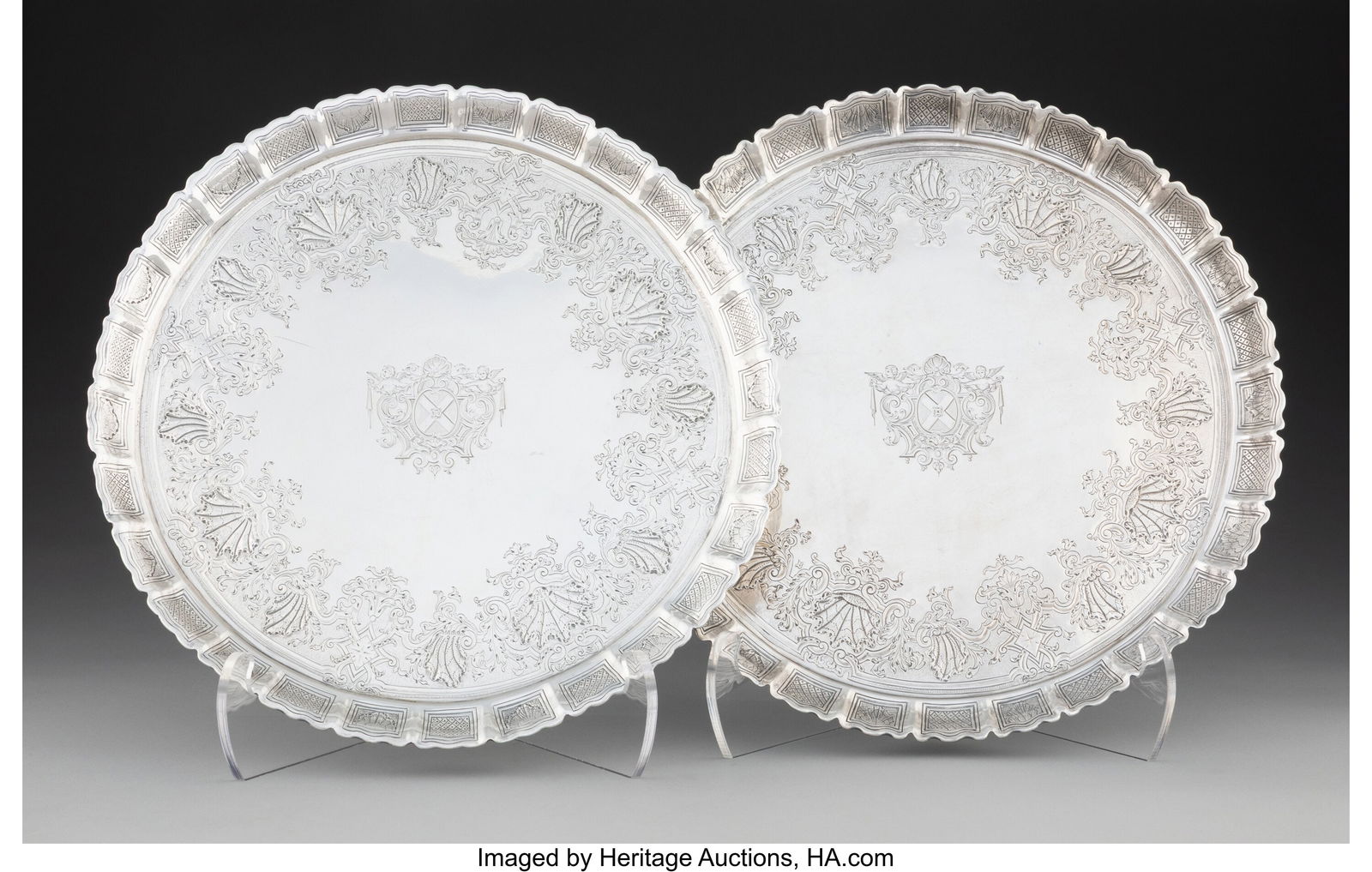 A Pair of George Wickes Silver Footed Salvers, L: A Pair of George Wickes Silver Footed Salvers, London, 1733-1734 Marks to one: (lion passant), (crowned leopard's head), effaced-GW, S 1-1/2