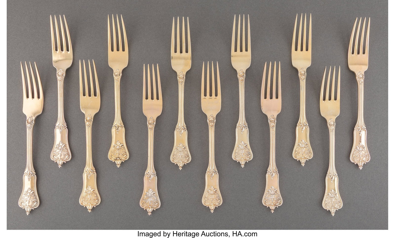A Set of Twelve Vollgold & Sohn Gilt Silver Dess: A Set of Twelve Vollgold & Sohn Gilt Silver Dessert Forks, Berlin, circa 1900 Marks: (crescent), (crown), 800, VOLLGOLD 7-1/2 inches &lp
