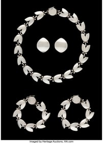 74201: A Five-Piece Georg Jensen Silver Jewelry Suite,