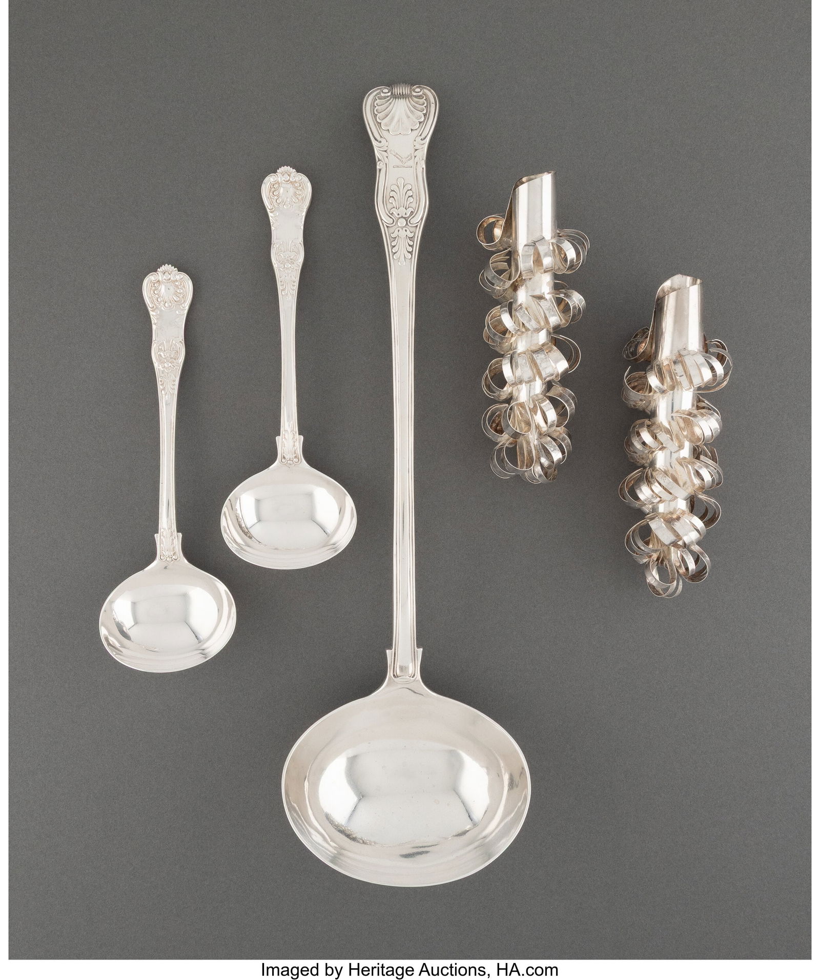 74250: A Collection of Three British Silver Flatware Serving Ladles and Two Portuguese Silver-